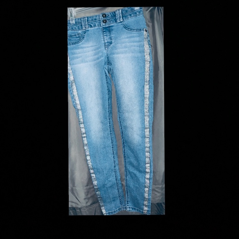 Blue jeans with sparkle on side.
